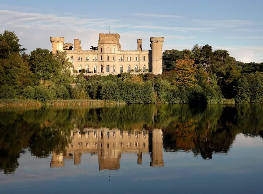 Eastnor Castle reflected in the lake below the house.